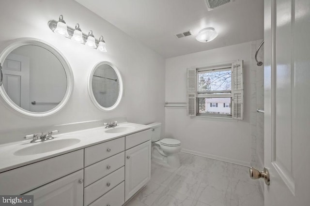 bathroom with marble finish floor, visible vents, and a sink