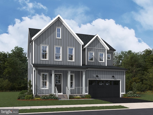 view of front of property with driveway, board and batten siding, an attached garage, and roof with shingles