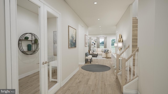 hall with french doors, recessed lighting, stairway, light wood-style floors, and baseboards