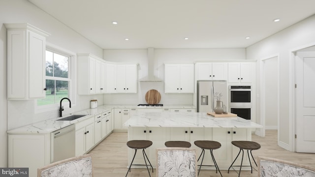 kitchen with white cabinets, a center island, white dishwasher, fridge with ice dispenser, and a sink