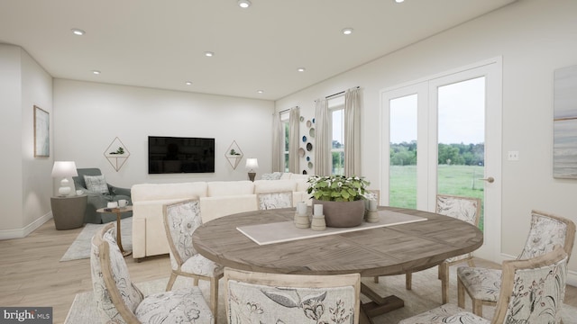 dining area with light wood-style floors, recessed lighting, and baseboards