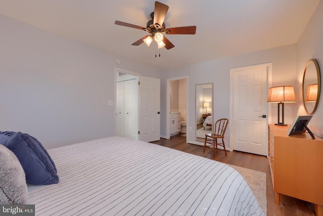 bedroom featuring ceiling fan and dark wood-type flooring