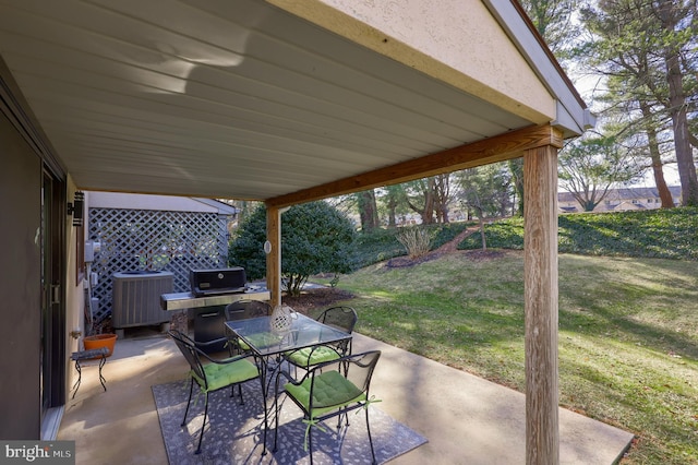 view of patio / terrace featuring outdoor dining space and central AC unit