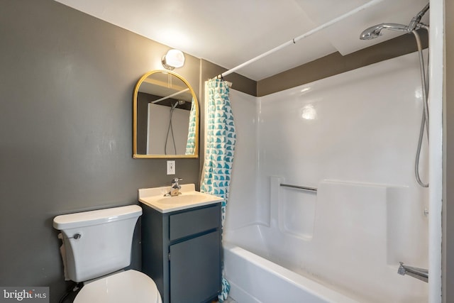 full bathroom featuring shower / tub combo, vanity, and toilet