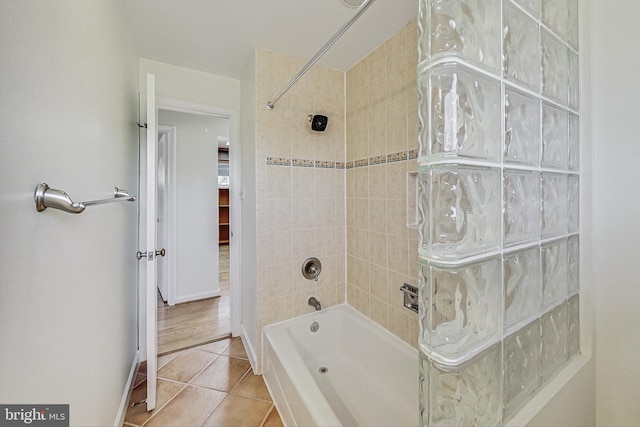 full bath with shower / washtub combination and tile patterned floors