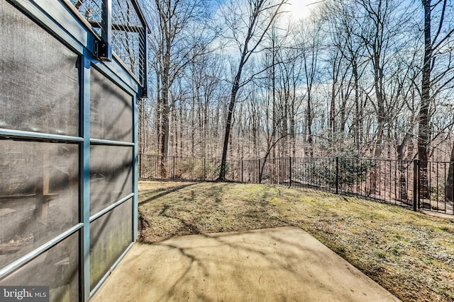 view of yard featuring a patio area and fence