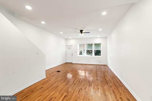 unfurnished living room featuring light wood-style floors, recessed lighting, ceiling fan, and baseboards