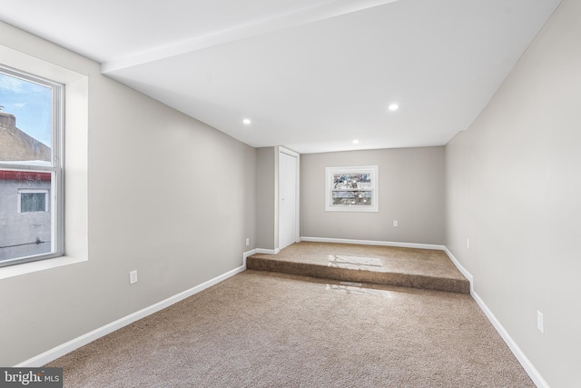 unfurnished room featuring baseboards, carpet flooring, and recessed lighting