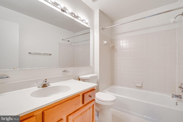 full bathroom with bathing tub / shower combination, toilet, and vanity