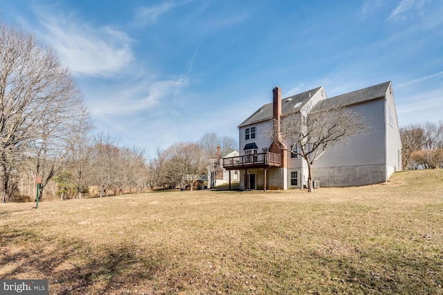 view of yard featuring a wooden deck