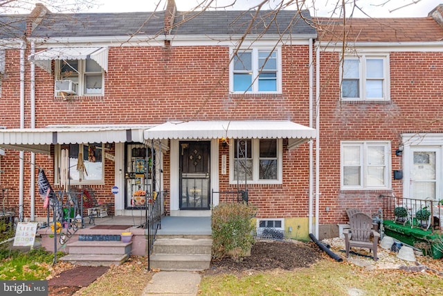 multi unit property featuring brick siding