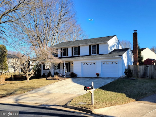 view of front of home featuring driveway, covered porch, an attached garage, and fence