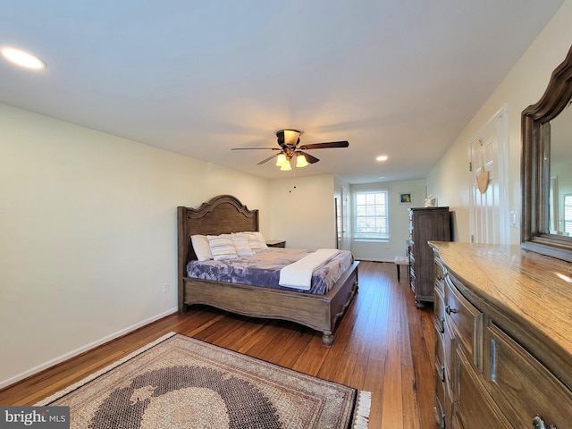 bedroom featuring ceiling fan, hardwood / wood-style floors, recessed lighting, and baseboards