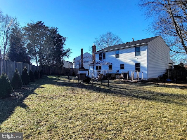 view of yard with a fenced backyard