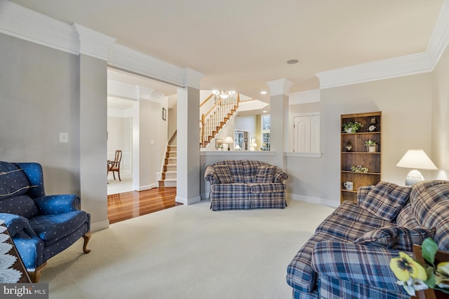 living room featuring stairway, baseboards, an inviting chandelier, crown molding, and carpet flooring