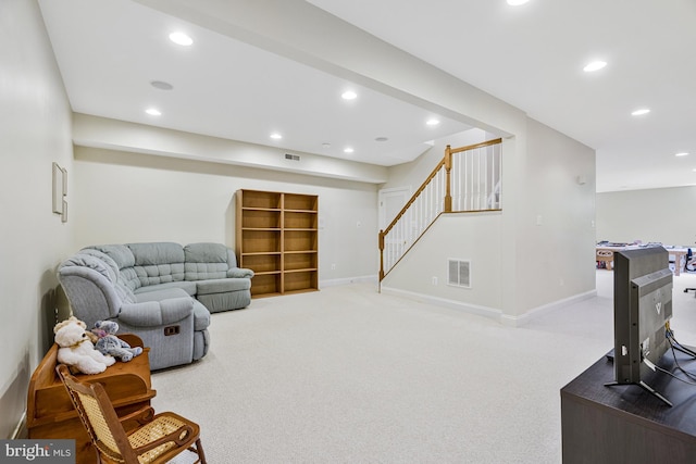 living area with stairway, recessed lighting, carpet, and visible vents