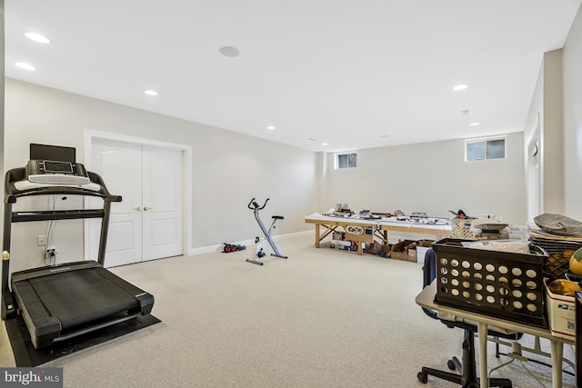 exercise room featuring visible vents, recessed lighting, baseboards, and carpet floors