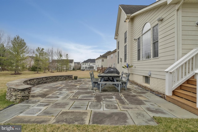 view of patio featuring outdoor dining space and grilling area