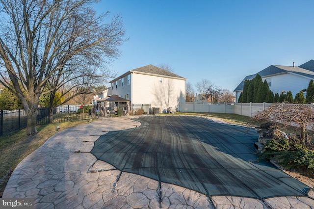 view of pool with fence private yard, a patio area, and a fenced in pool