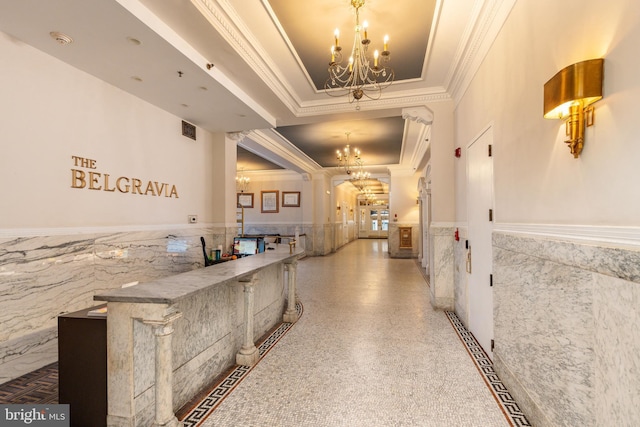 welcome area featuring a chandelier and visible vents