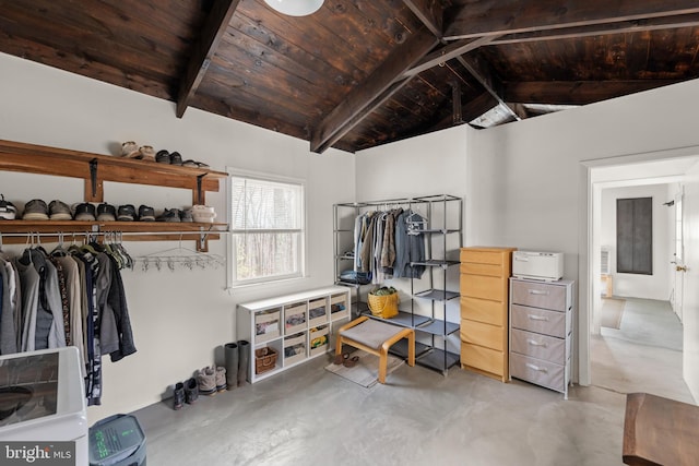 walk in closet featuring lofted ceiling with beams