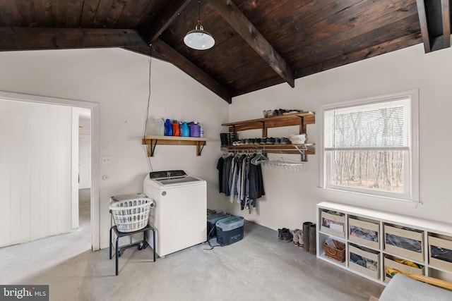 washroom featuring wood ceiling, laundry area, and washer / dryer