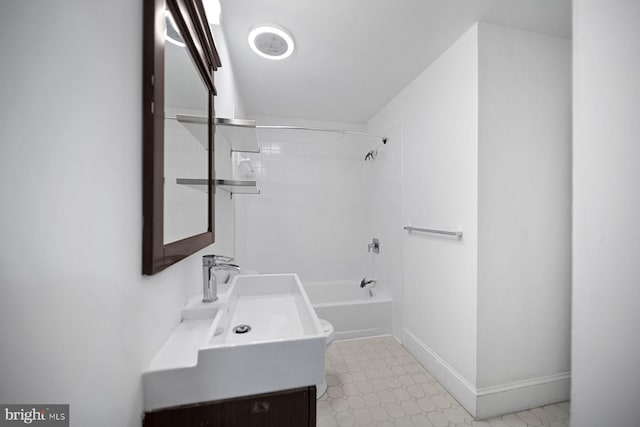 full bathroom featuring shower / bathing tub combination, vanity, and baseboards