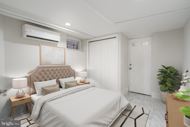 bedroom with recessed lighting, baseboards, marble finish floor, a wall mounted AC, and a closet