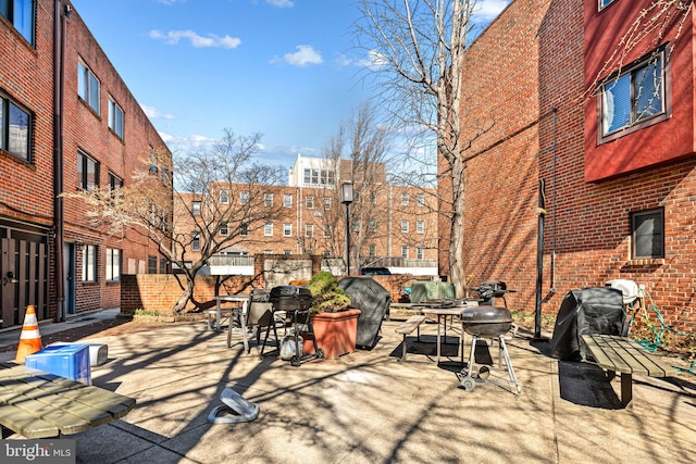 view of patio with a grill