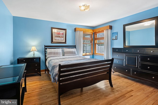 bedroom featuring light wood finished floors