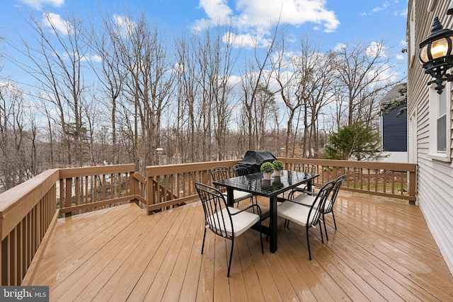 deck featuring outdoor dining space