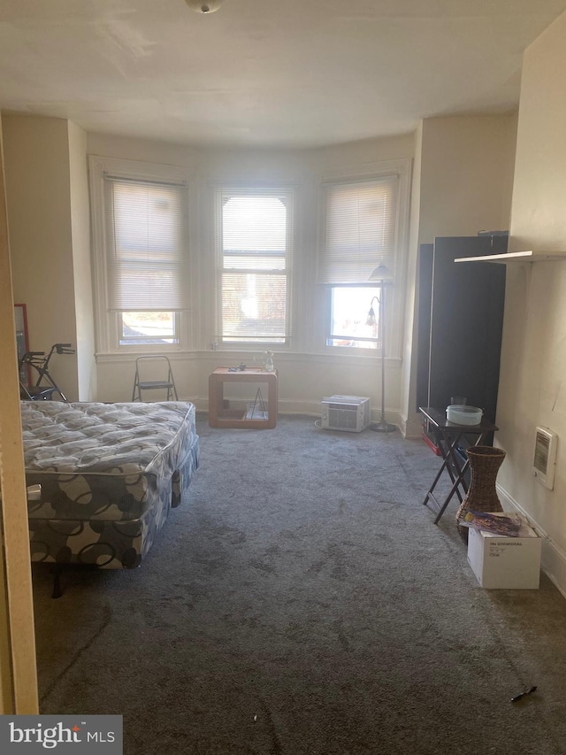 unfurnished bedroom with carpet floors