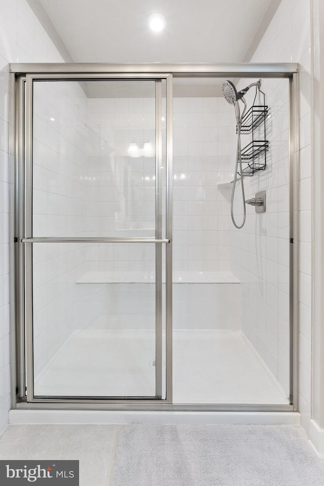 bathroom featuring a stall shower