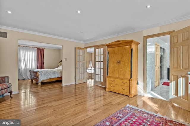 bedroom featuring recessed lighting, baseboards, ornamental molding, french doors, and light wood finished floors