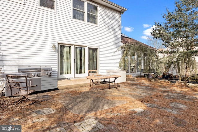 back of property with a patio area