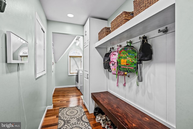 mudroom with baseboards and wood finished floors