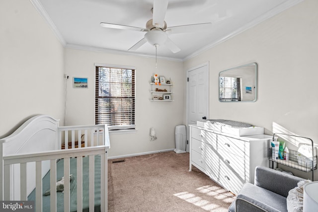 bedroom with light colored carpet, visible vents, ornamental molding, ceiling fan, and baseboards