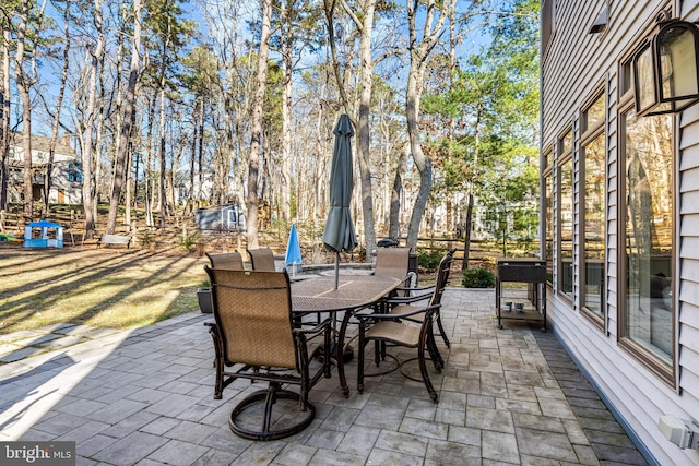 view of patio featuring outdoor dining space