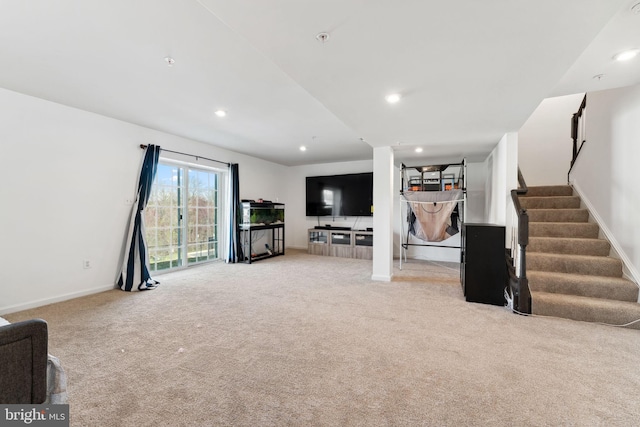 interior space featuring light colored carpet, stairs, baseboards, and recessed lighting