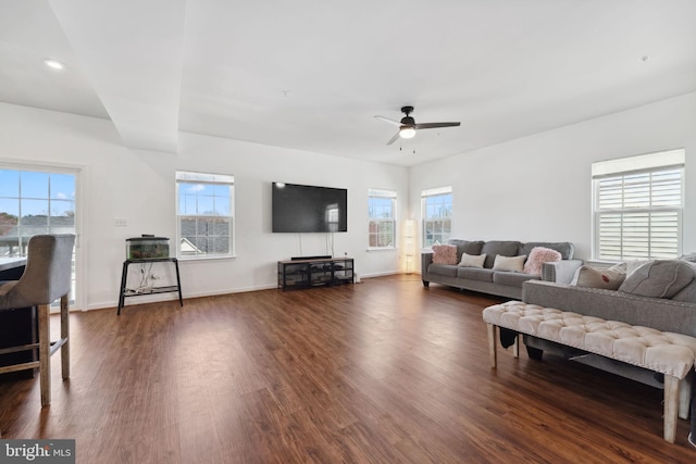 living area with baseboards, ceiling fan, recessed lighting, and dark wood-style flooring