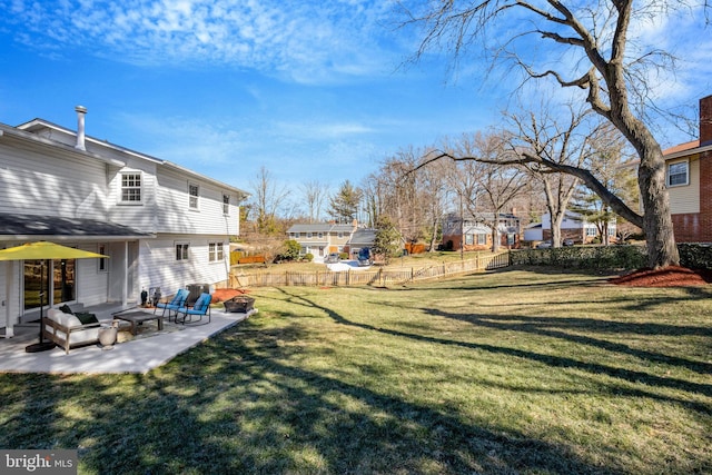 view of yard featuring a patio area and fence