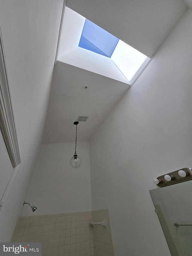 interior details with a skylight and visible vents