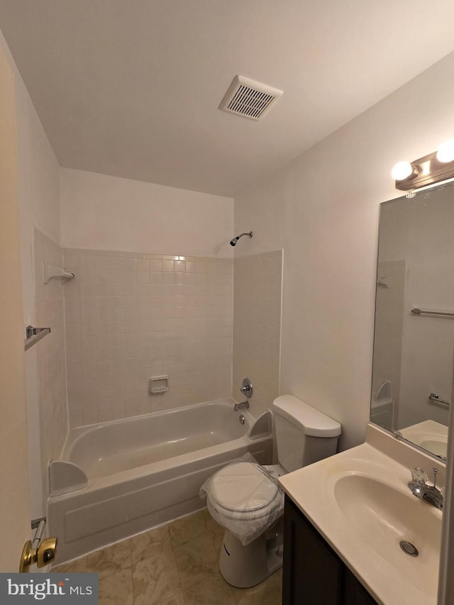 bathroom featuring visible vents, vanity, toilet, and shower / bathtub combination