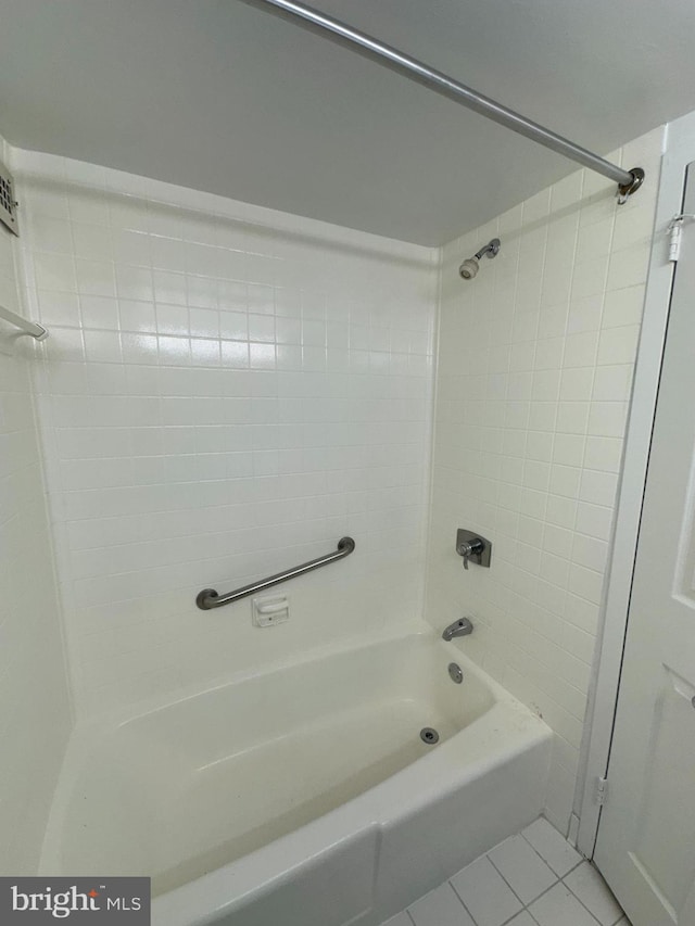 full bathroom featuring tile patterned flooring and shower / bathtub combination