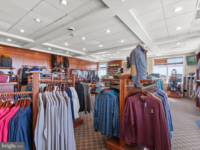 misc room with plenty of natural light, coffered ceiling, carpet flooring, and beamed ceiling