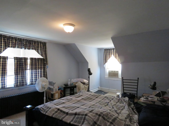 bedroom featuring lofted ceiling and cooling unit