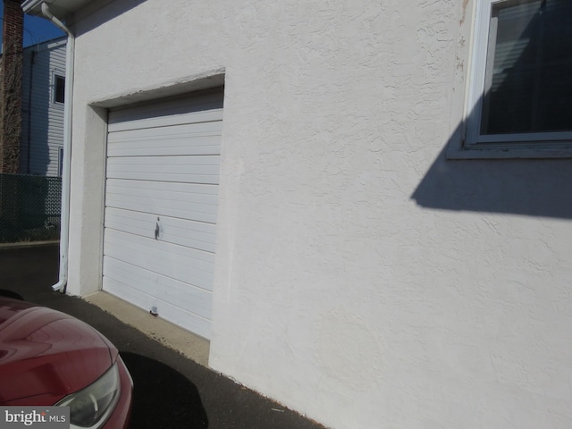 exterior space featuring stucco siding