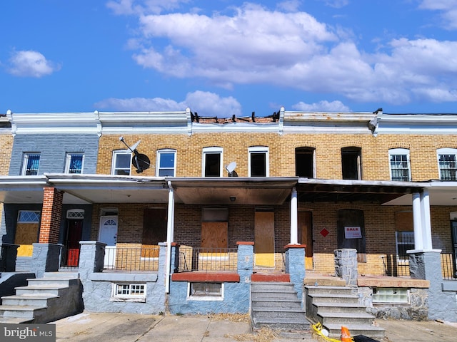 multi unit property featuring brick siding