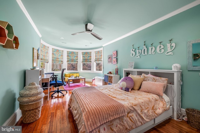 4502 Roland Ave, Baltimore, MD 21210 - bedroom with crown molding, hardwood / wood-style flooring, baseboards, and ceiling fan