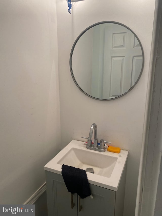 bathroom featuring vanity and baseboards